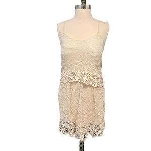 Giana Bini cream lace cocktail dress with strapped back, knee length
